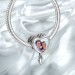 Photo Charm Strolling By The Sea With Heart-Shaped Silver